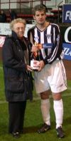 Stevie Crawford accepts the sponsors man of the match award