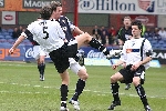 Dundee v Pars 9th April 2005. Andrius Skerla and Gary Mason in action.