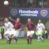 Hearts v Pars. 31st August 2003. Midfield action at Tynecastle.