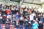 Pars v Airdrie Utd. 12th January 2013. Supporters in the Norrie Stand on minutes applause.