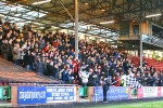 Pars v Airdrie Utd. 12th January 2013. Supporters in the North Stand on minutes applause.