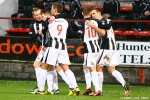 Pars v Airdrie Utd. 12th January 2013. Ryan Wallace celebrates with Stephen Husband and others.