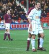 Pars v Hearts 6th December 2003. Noel Hunt and his shadow.