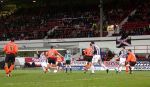 Barry Nicholson having a left foot shot from outside the box