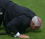 Pars v Celtic 9th August 2003. Jim Leishman kissing the sacred turf for the last time.