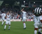 Pars v Celtic 9th August 2003. Pars enter the turfed stadium for the last time.