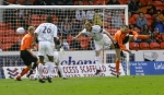 Greg Shields keeps Dundee United at bay.