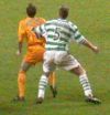 Celtic v Dunfermline Athletic 29/12/02 Gary `Judge` Dempsey about to get clattered by Joos Valgaeren