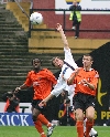 Dundee Utd. v Pars 30th Oct 2004. Andrius Skerla v Jason Scotland.