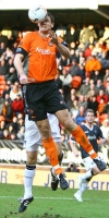 Dundee Utd v Pars 27th January 2007. Lee Wilkie beats Stevie Crawford.