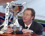 Jimmy Nicholl hands on the cup