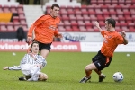 Pars v Dundee Utd. 25th February 2006. Aaron Labonte in the thick of it.