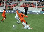 Pars v Dundee Utd. 17th April 2004. David Grondin in action against Collin Samuel