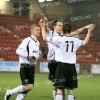 Pars v Queen of the South 22nd December 2007. <s>James Nesbitt</s> Nick Phinn celebrates with Calum Woods and Michael Mc